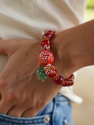 Bracciale con melagrana e perle di pietre di Agata e Corniola